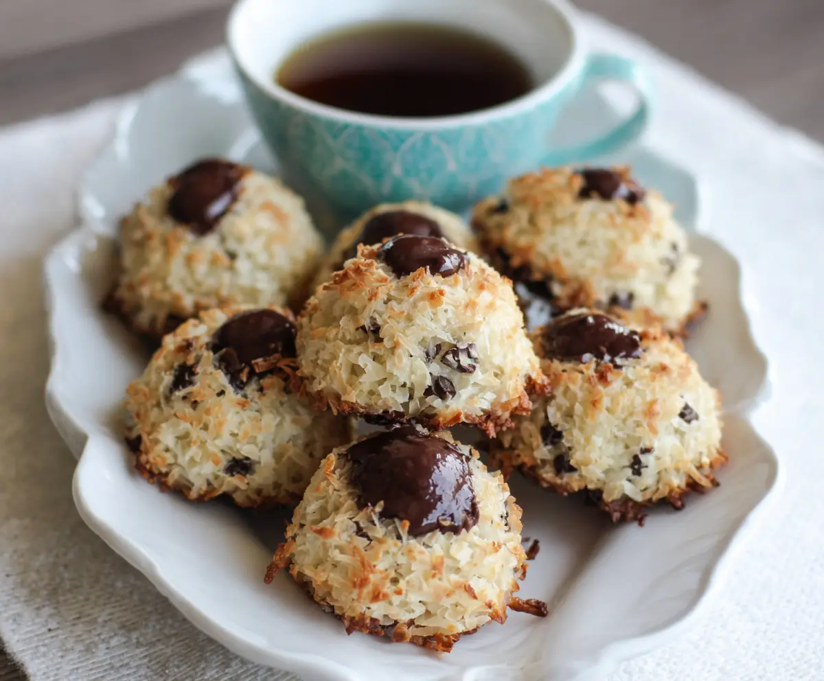 Delicious chocolate chip coconut macaroons on a white plate, perfect for dessert lovers.