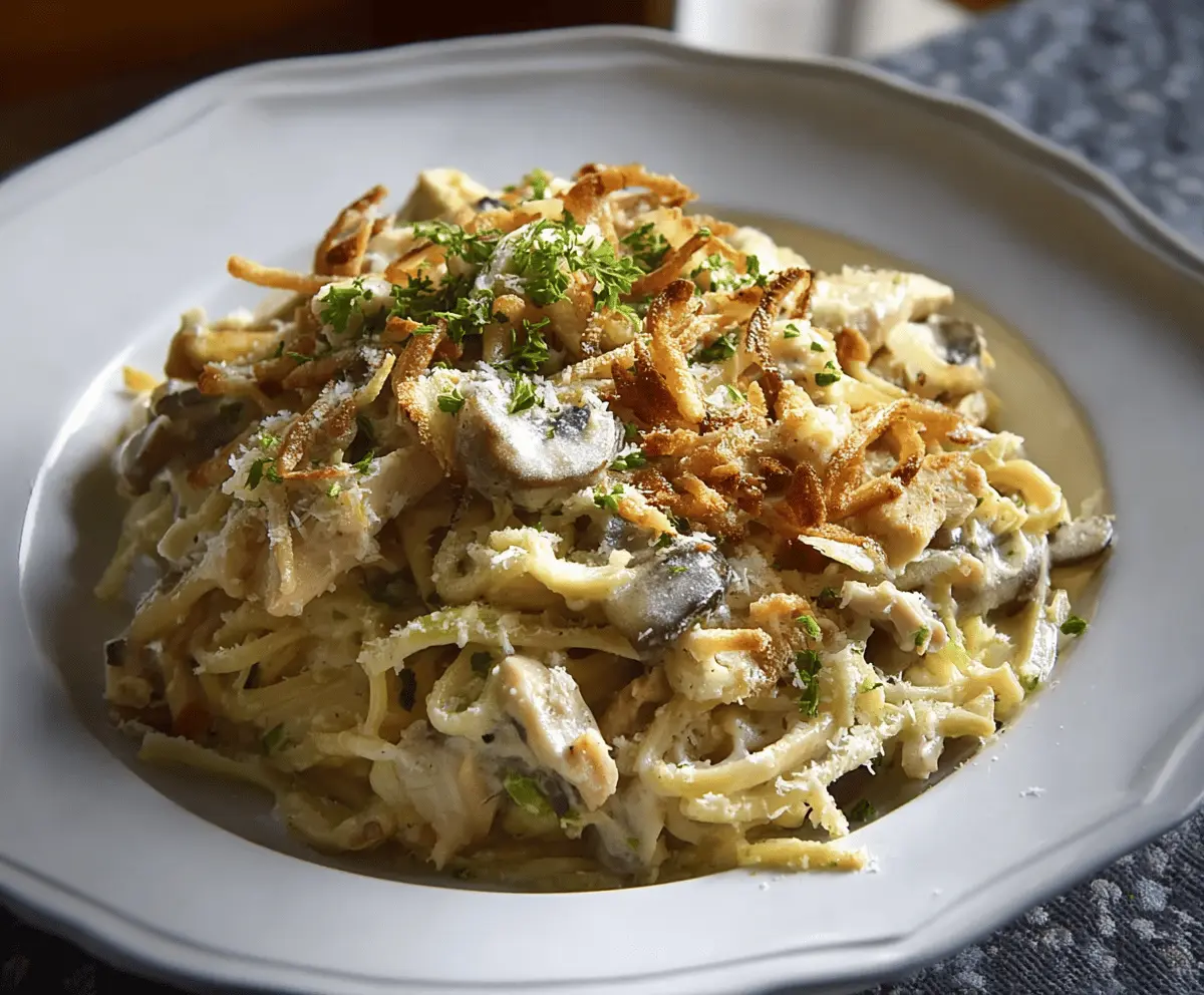 Delicious Easy Turkey Tetrazzini served in a white bowl with pasta and turkey slices