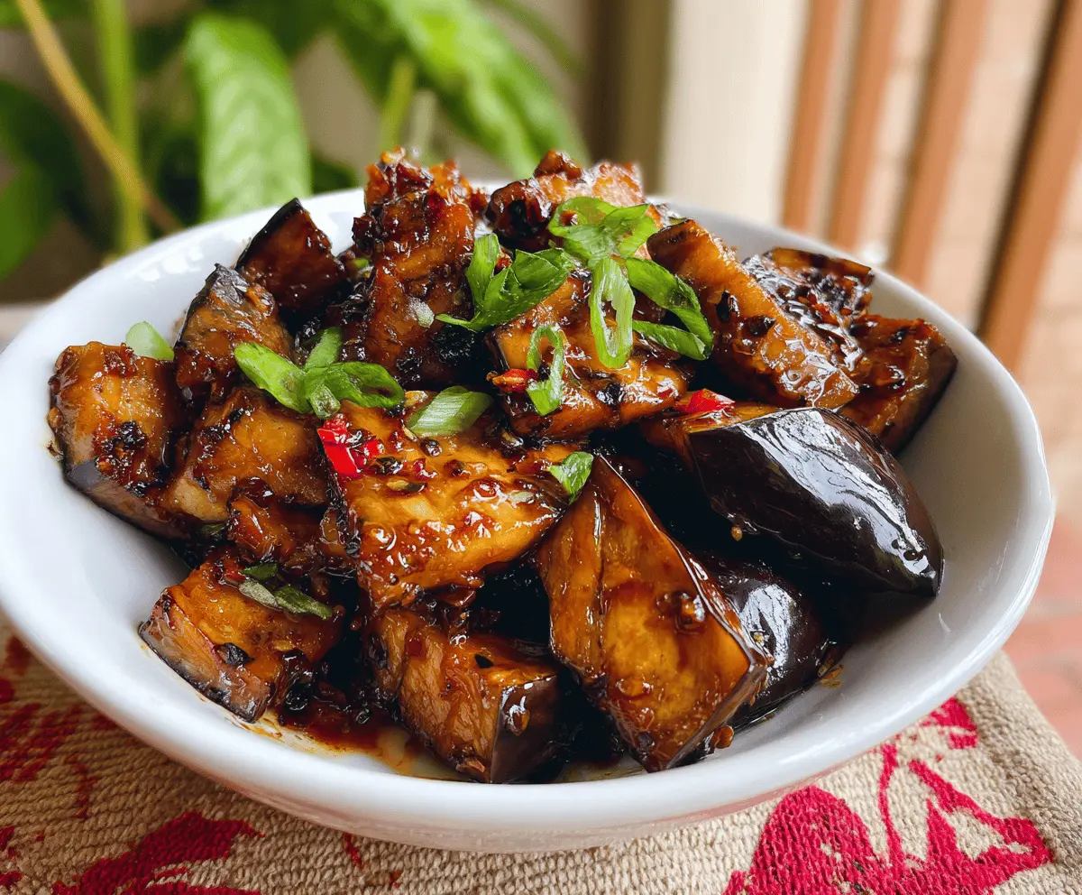 Delicious sticky garlic eggplant dish with crispy edges and savory sauce