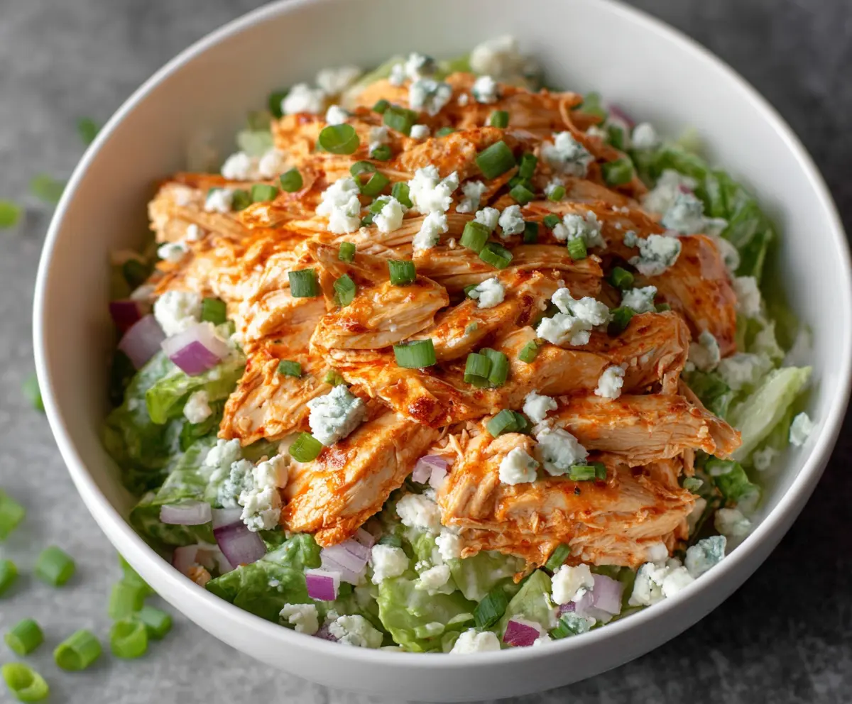 Creamy buffalo chicken salad with fresh vegetables and a tangy dressing.