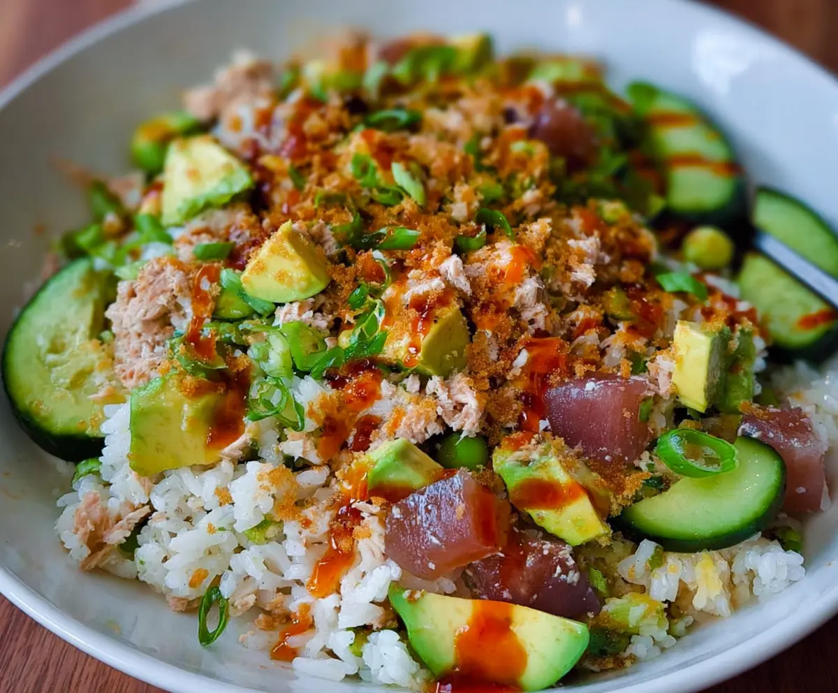 Delicious Tuna Avocado Crispy Rice Salad featuring fresh avocado, flaky tuna, and crispy rice for a healthy summer dish.