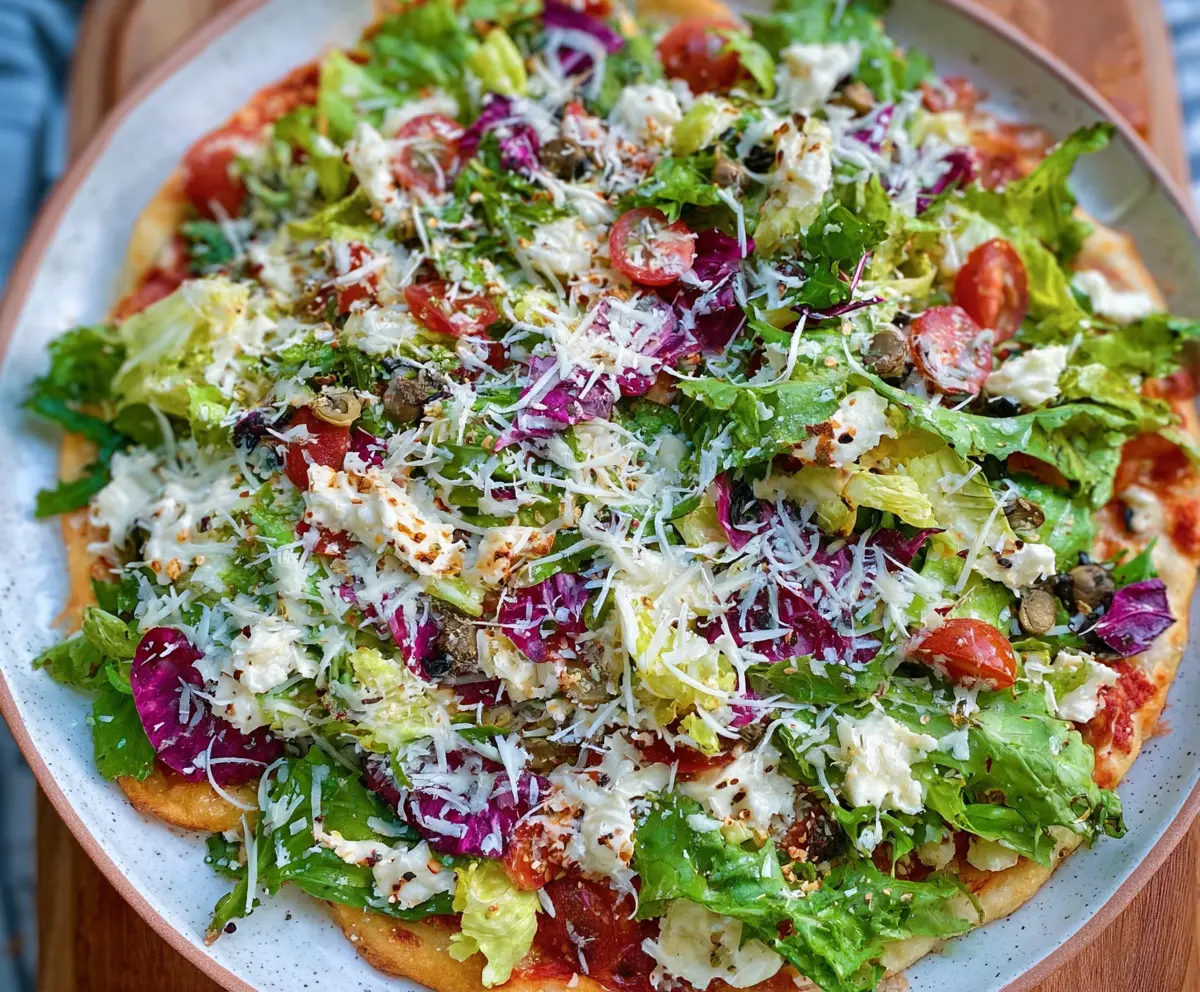 Fresh Pizza Night Salad with colorful vegetables and greens for a healthy dinner image.